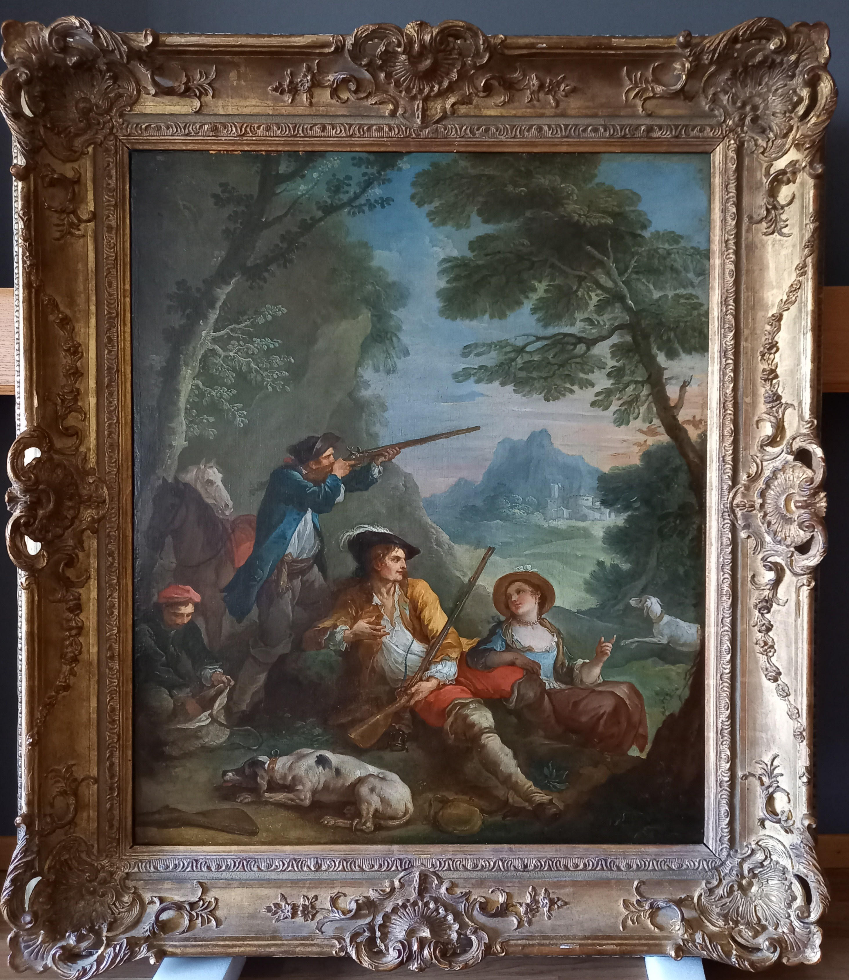 Hunter and Young Woman resting in a Landscape with a Hunter aiming his Gun at a passing Flock of Birds, and Hunters on Horseback conversing with a Shepherdess spinning (a pair of paintings)